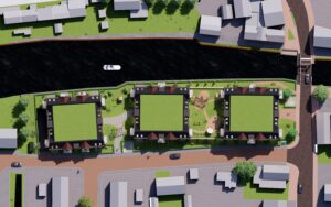 Bovenaanzicht van de appartementen Driebruggen nabij Woerden, met drie woonblokken langs het water en groene zones tussen de bebouwing.